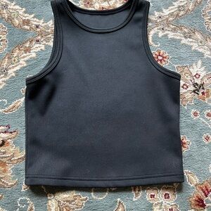 Chic Black Tank Top with Ribbed Texture and Sleeveless Design